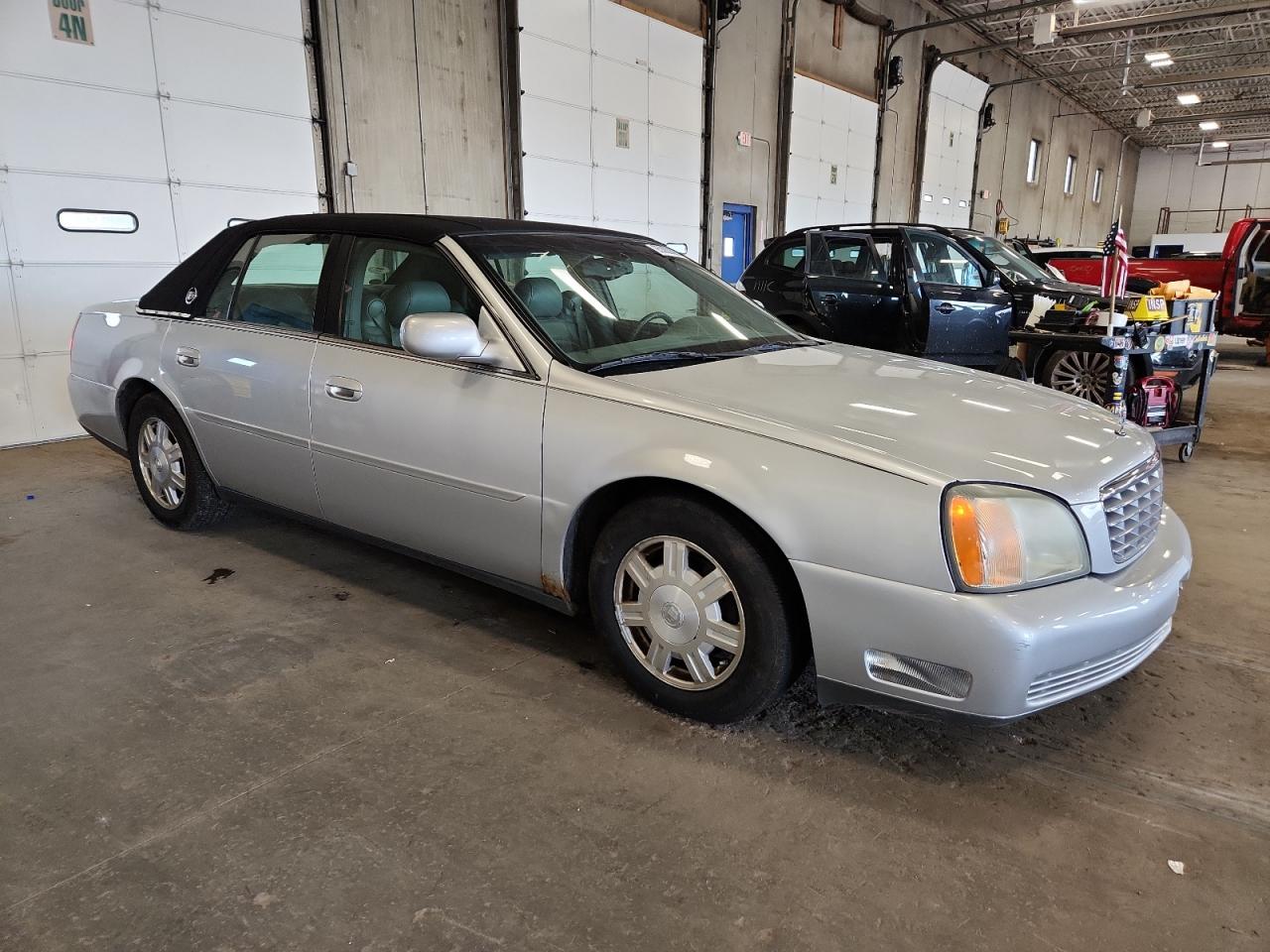 2003 Cadillac Deville VIN: 1G6KD54Y43U122323 Lot: 65383305