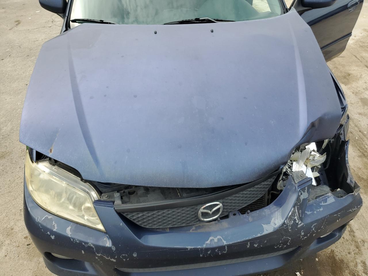 2002 Mazda Protege Pr5 VIN: JM1BJ245321502702 Lot: 64486415