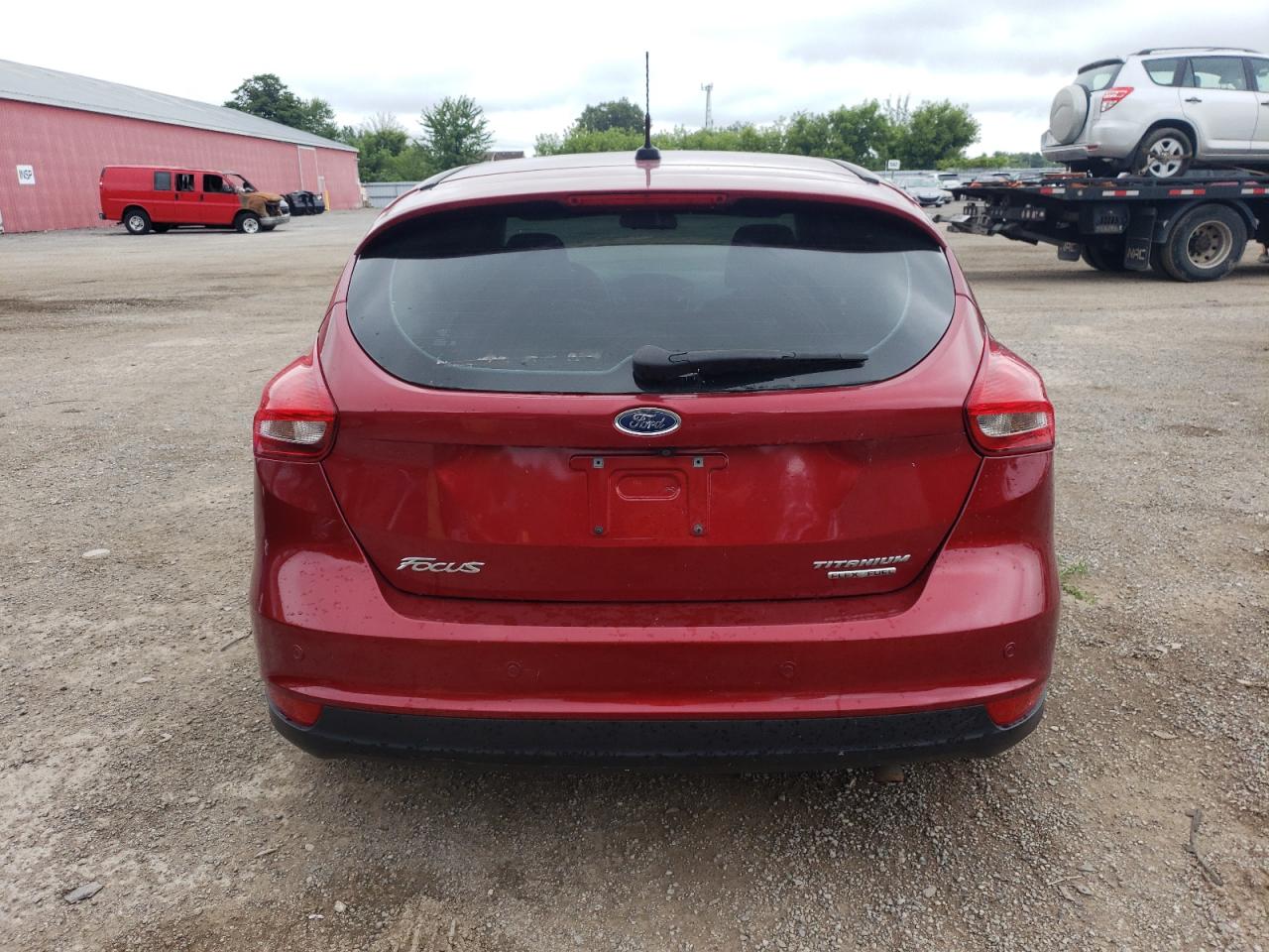 2015 Ford Focus Titanium VIN: 1FADP3N23FL368551 Lot: 65342025