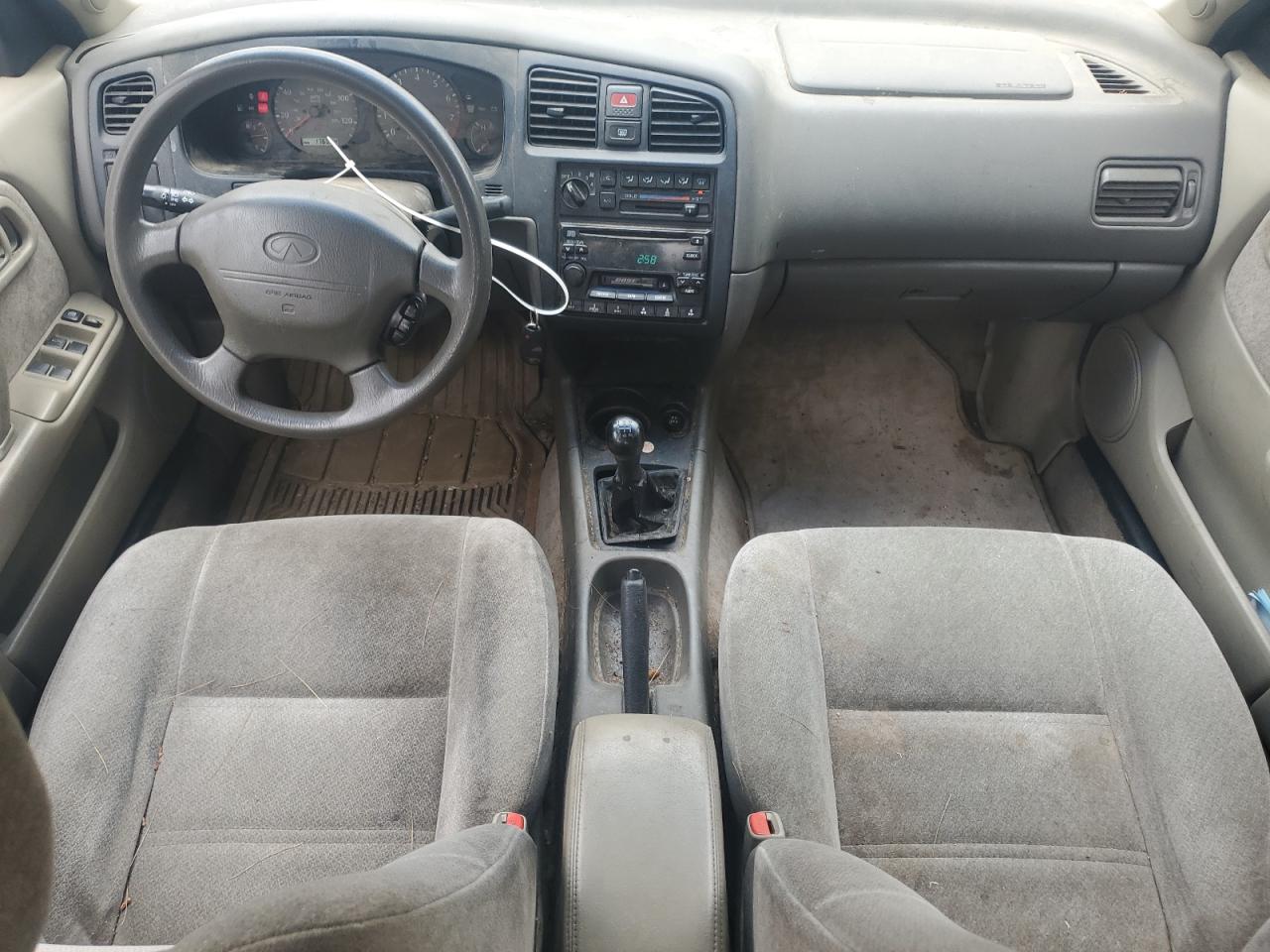 1999 Infiniti G20 VIN: JNKCP11A0XT009374 Lot: 63001565