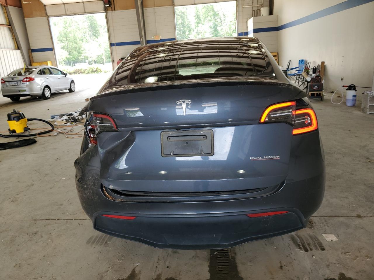 2023 Tesla Model Y VIN: 7SAYGDEF5PF595879 Lot: 65280985