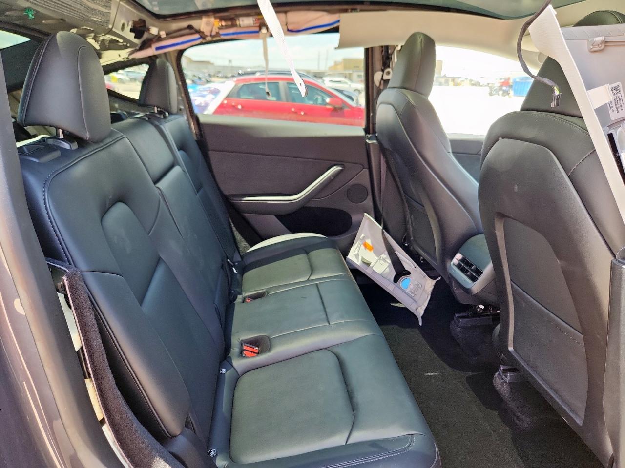 2023 Tesla Model Y VIN: 7SAYGDEE2PA087874 Lot: 66696225