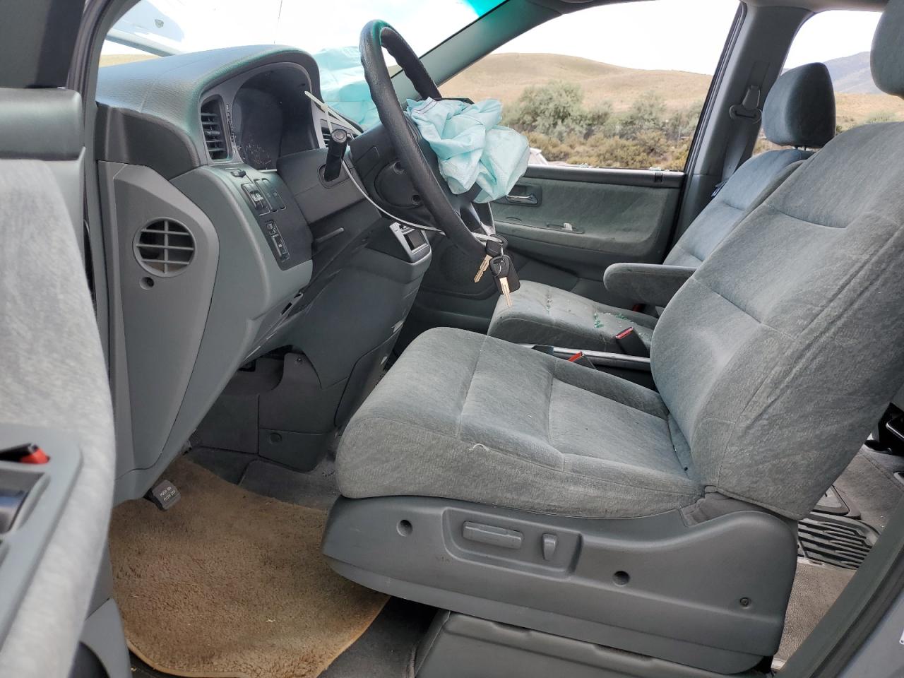 2000 Honda Odyssey Ex VIN: 2HKRL186XYH580787 Lot: 63162975