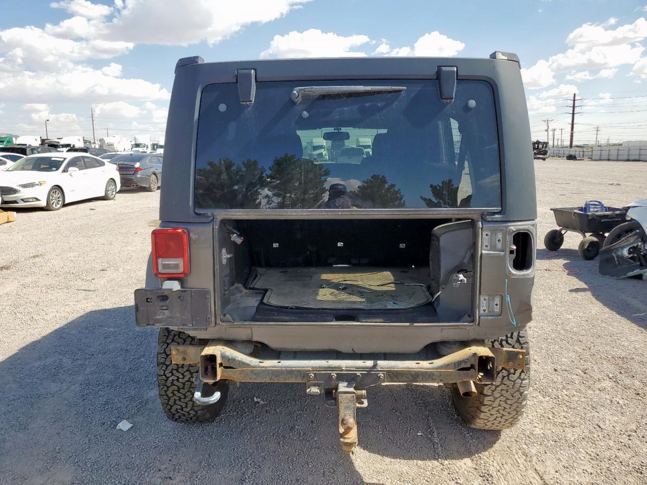 2014 Jeep Wrangler Unlimited Rubicon VIN: 1C4HJWFGXEL205810 Lot: 65348765