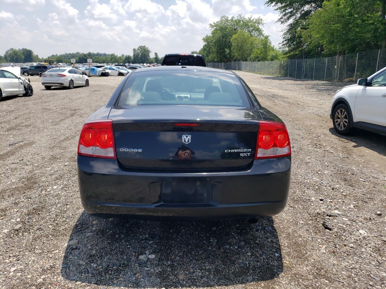 2009 Dodge Charger Sxt VIN: 2B3KA33V99H618586 Lot: 64639175