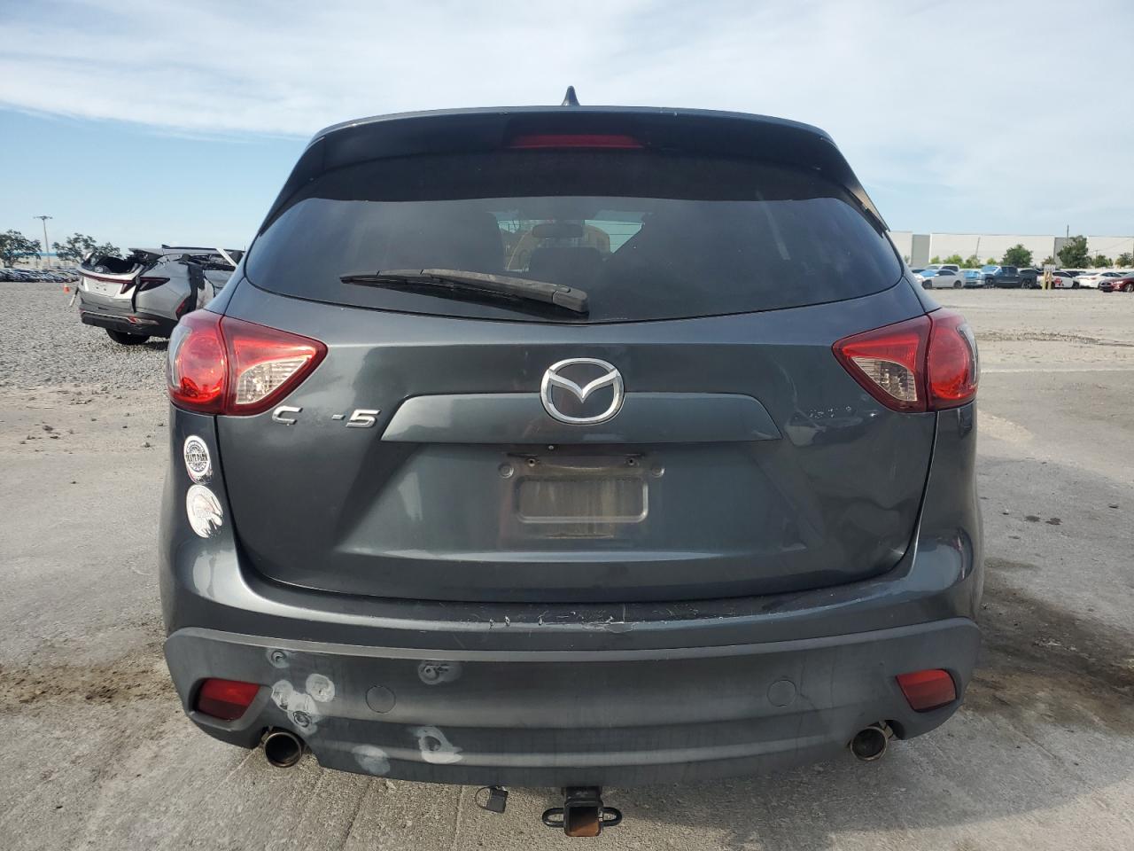 2013 Mazda Cx-5 Touring VIN: JM3KE2CE1D0166134 Lot: 63757225
