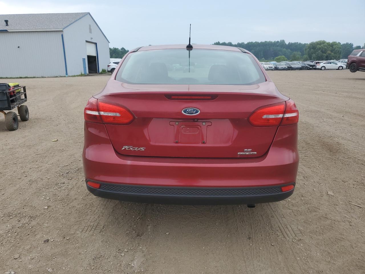 2015 Ford Focus Se VIN: 1FADP3F27FL260299 Lot: 65041775