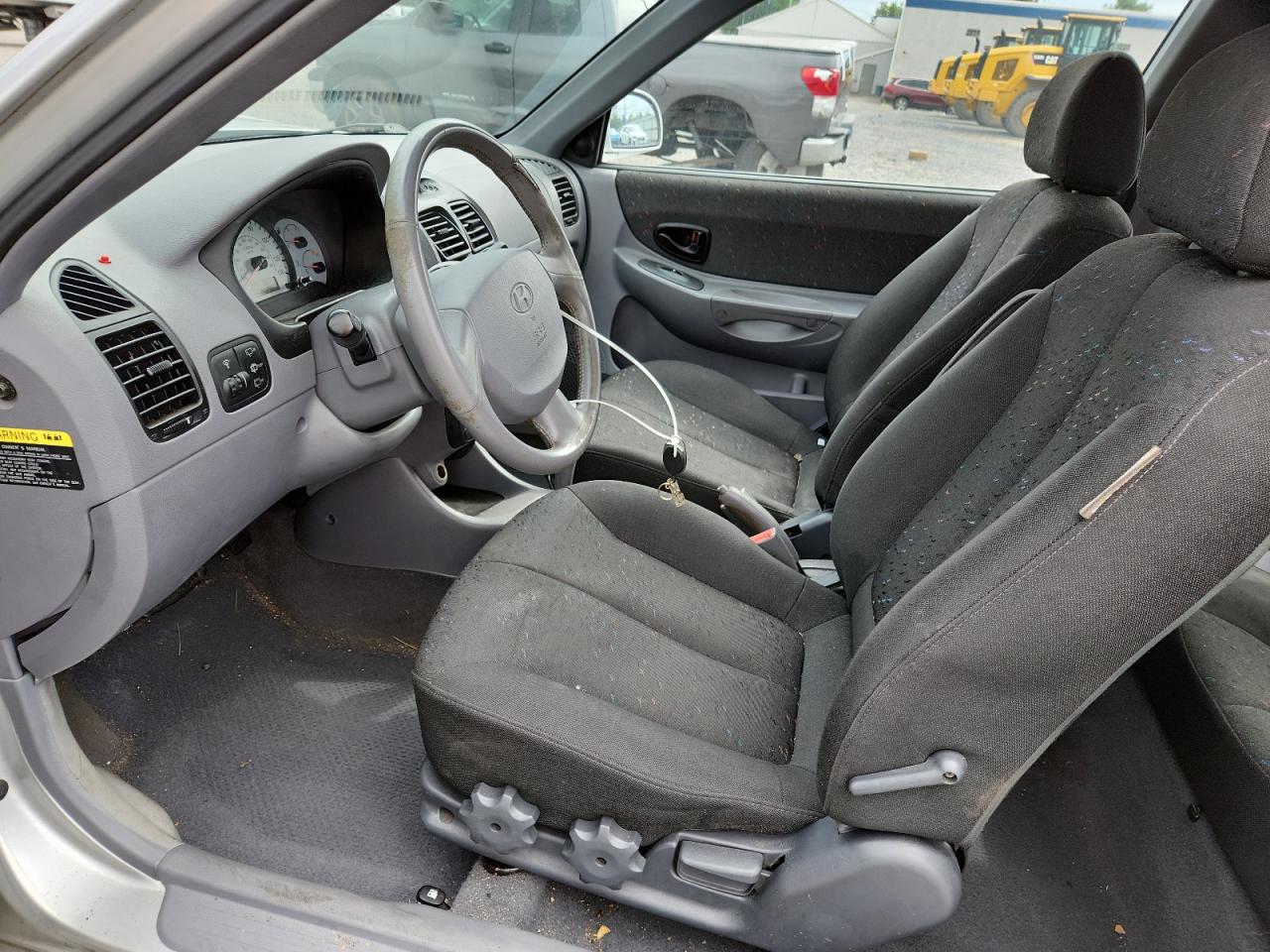 2004 Hyundai Accent Gl VIN: KMHCG35CX4U306713 Lot: 64479445