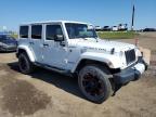 2012 JEEP WRANGLER UNLIMITED SAHARA   à vendre chez Copart AB - CALGARY
