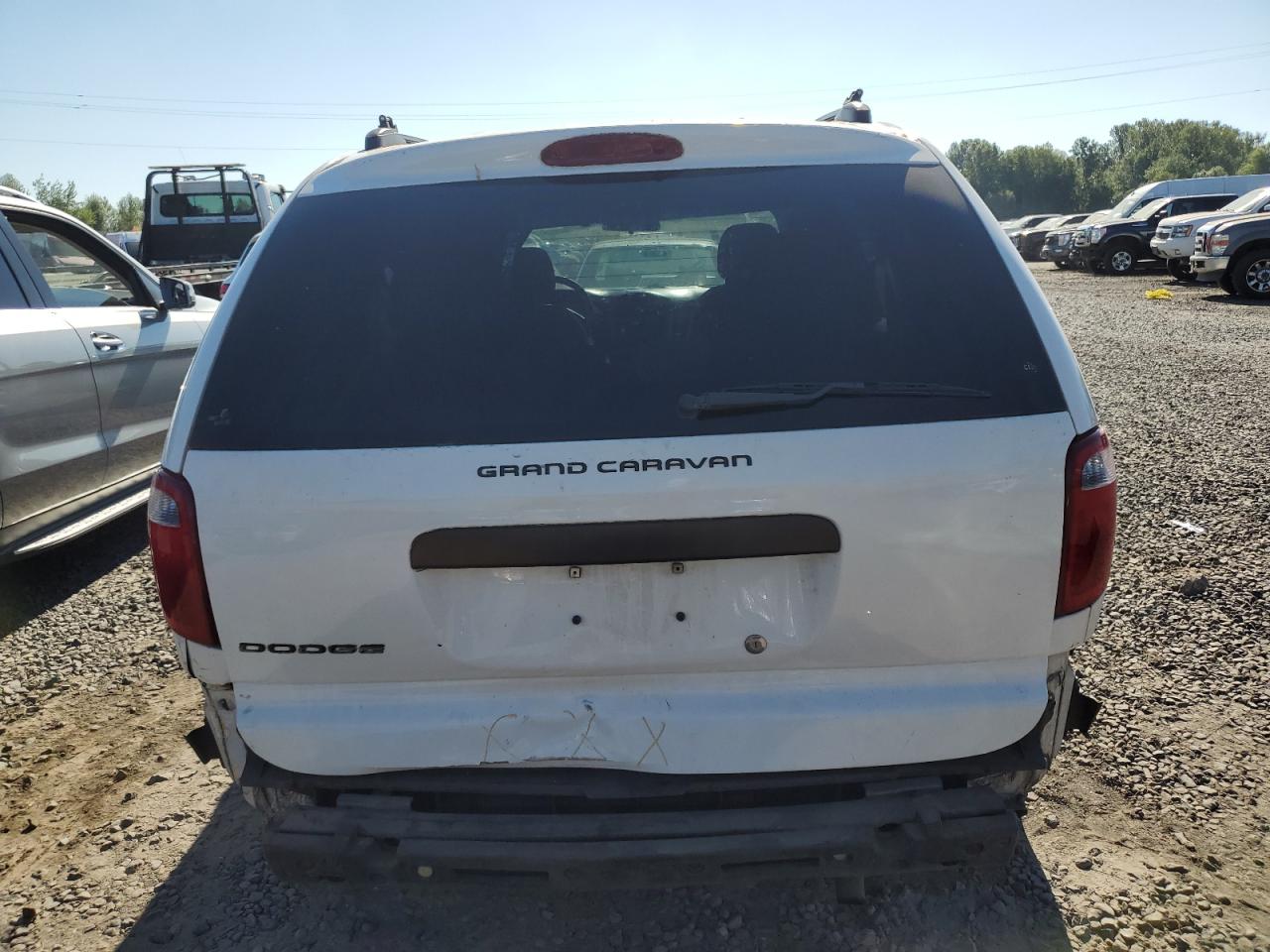 2005 Dodge Caravan Sxt VIN: 1D4GP45R15B394101 Lot: 65929425
