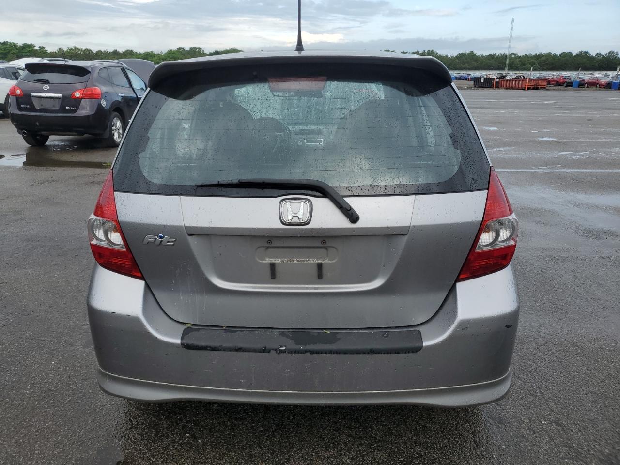 2007 Honda Fit S VIN: JHMGD37617S047260 Lot: 64701395