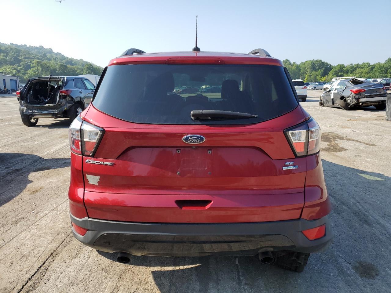 2018 Ford Escape Se VIN: 1FMCU9GD3JUC30233 Lot: 64203535