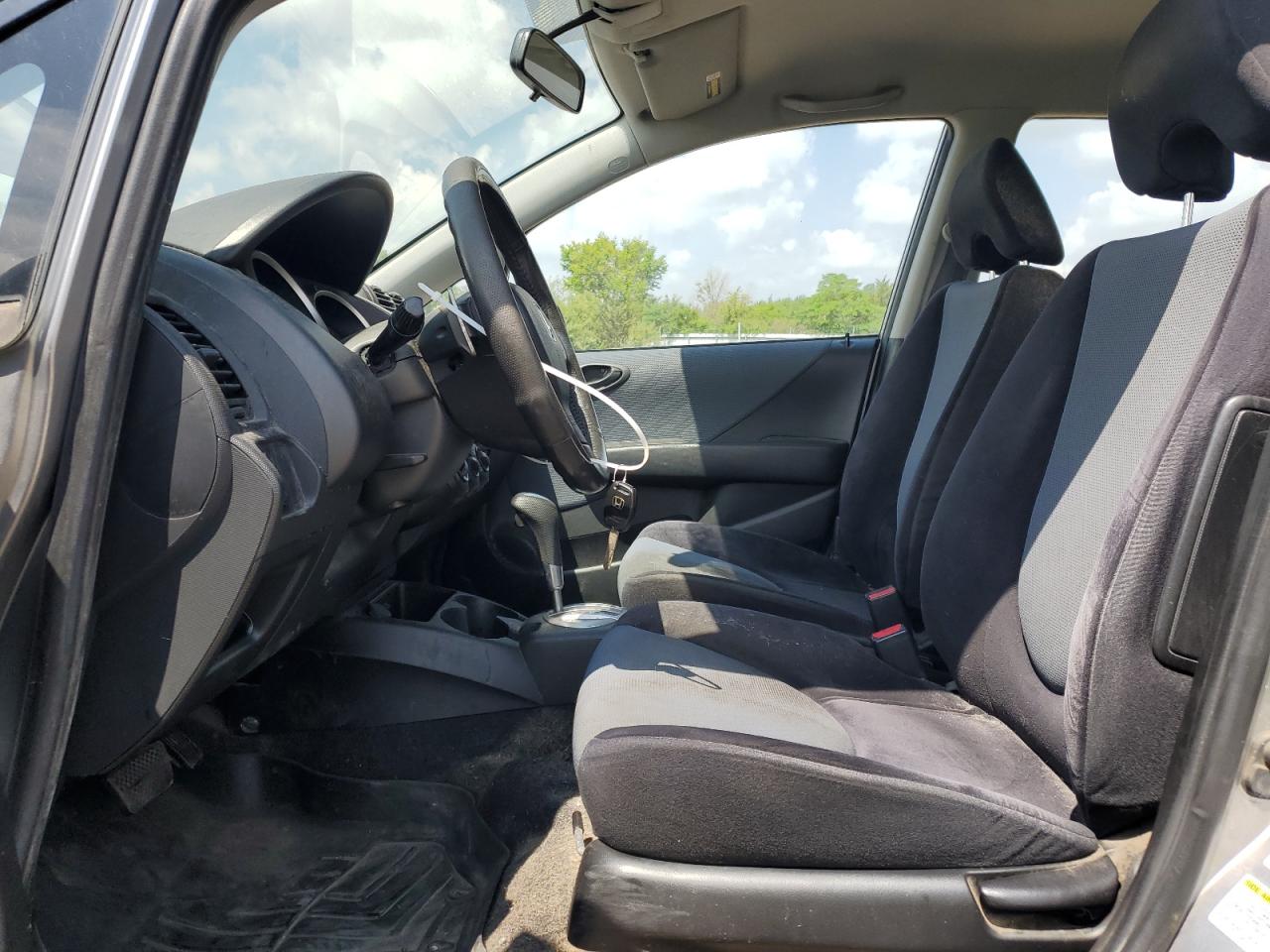 2007 Honda Fit S VIN: JHMGD38687S067648 Lot: 64657345