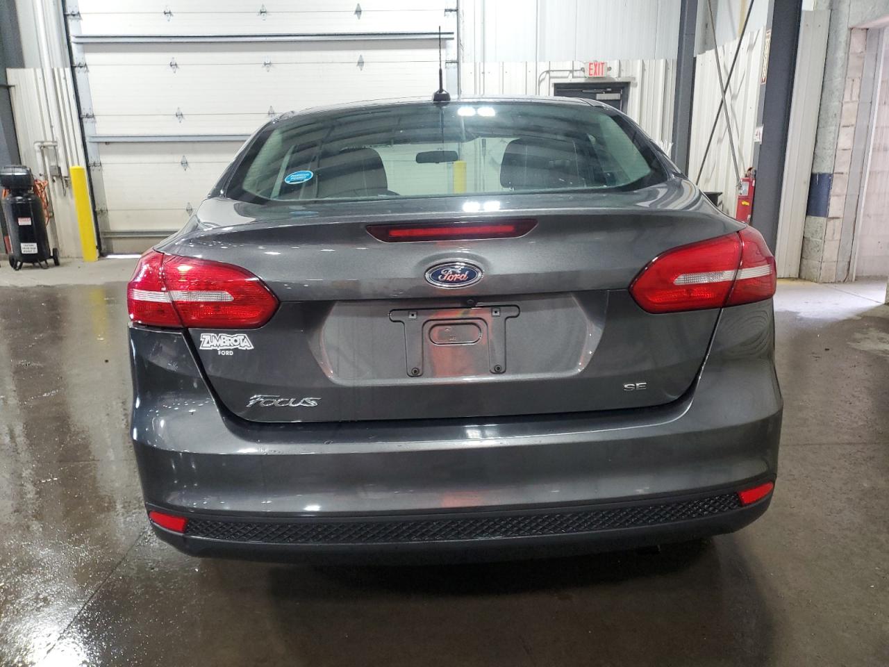 2016 Ford Focus Se VIN: 1FADP3F24GL303272 Lot: 64971455