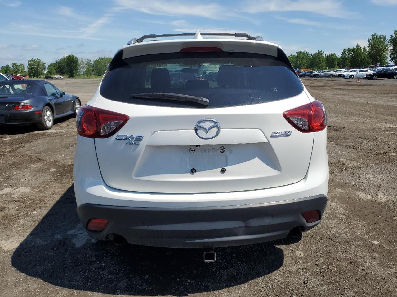 2015 Mazda Cx-5 Touring VIN: JM3KE4CY1F0506598 Lot: 64041235