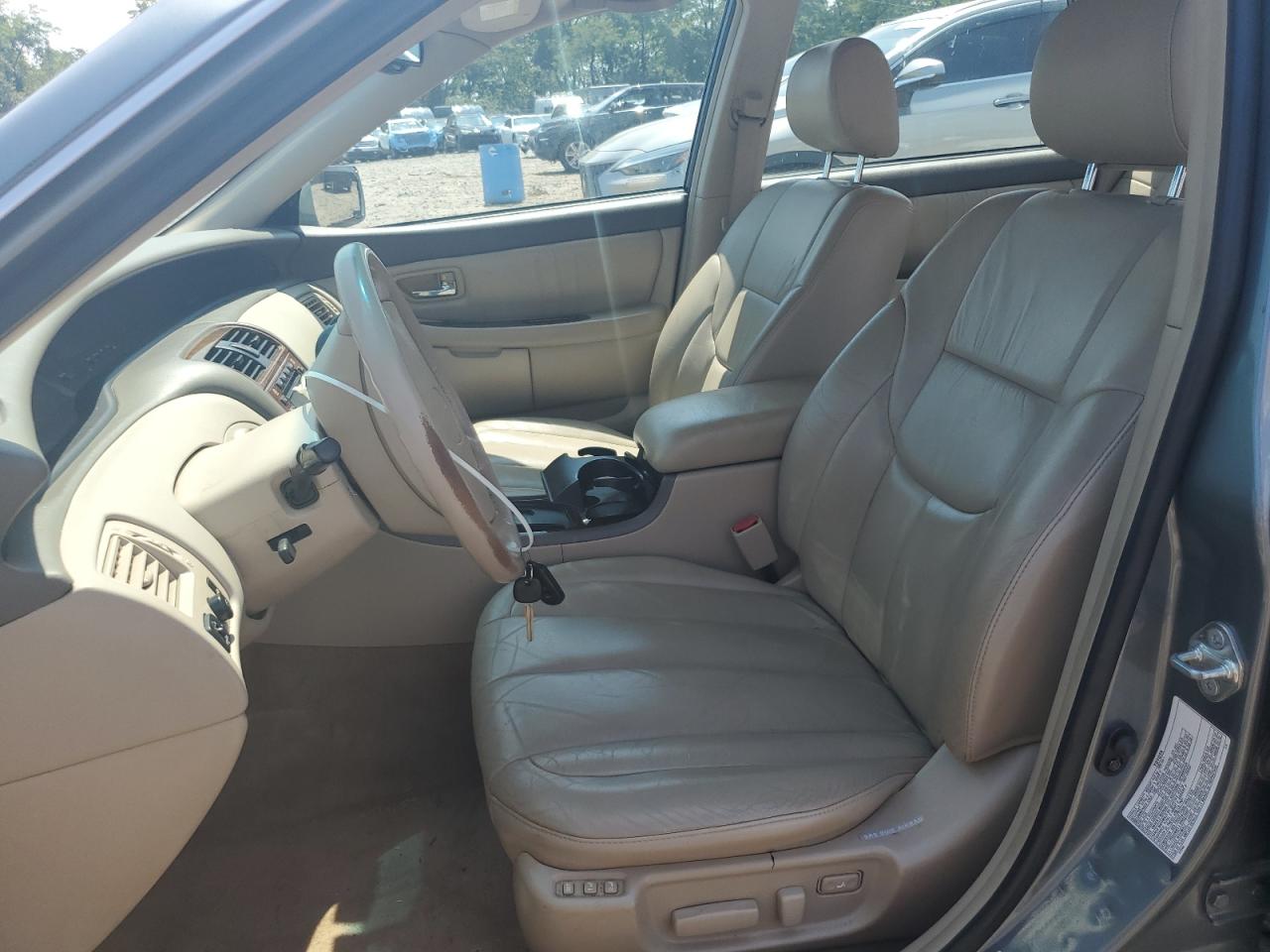 2000 Toyota Avalon Xl VIN: 4T1BF28B8YU017413 Lot: 63616685