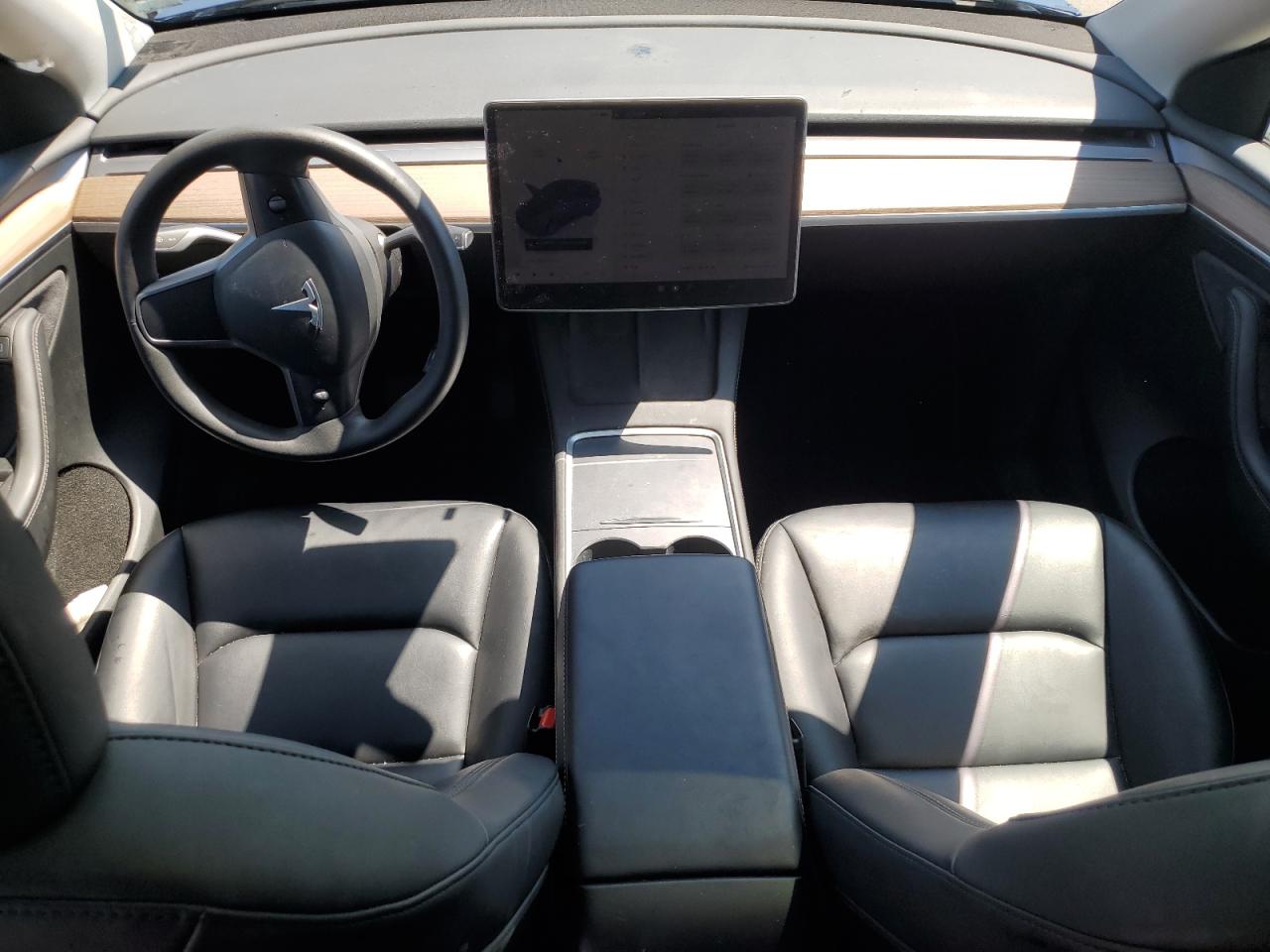 2023 Tesla Model Y VIN: 7SAYGAEE4PF700174 Lot: 65829205