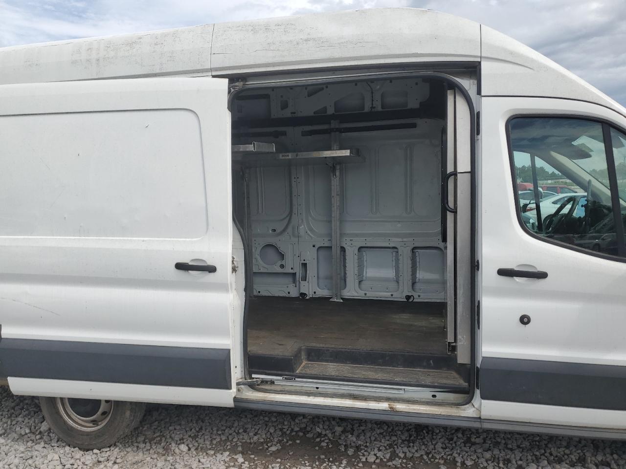 2015 Ford Transit Cargo Van T- VIN: 1FTSW3XM7FKB09943 Lot: 64839725