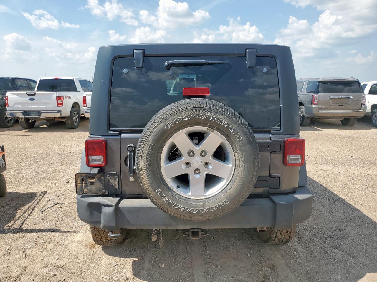 2014 Jeep Wrangler Unlimited Sport VIN: 1C4BJWDG1EL167702 Lot: 65360465
