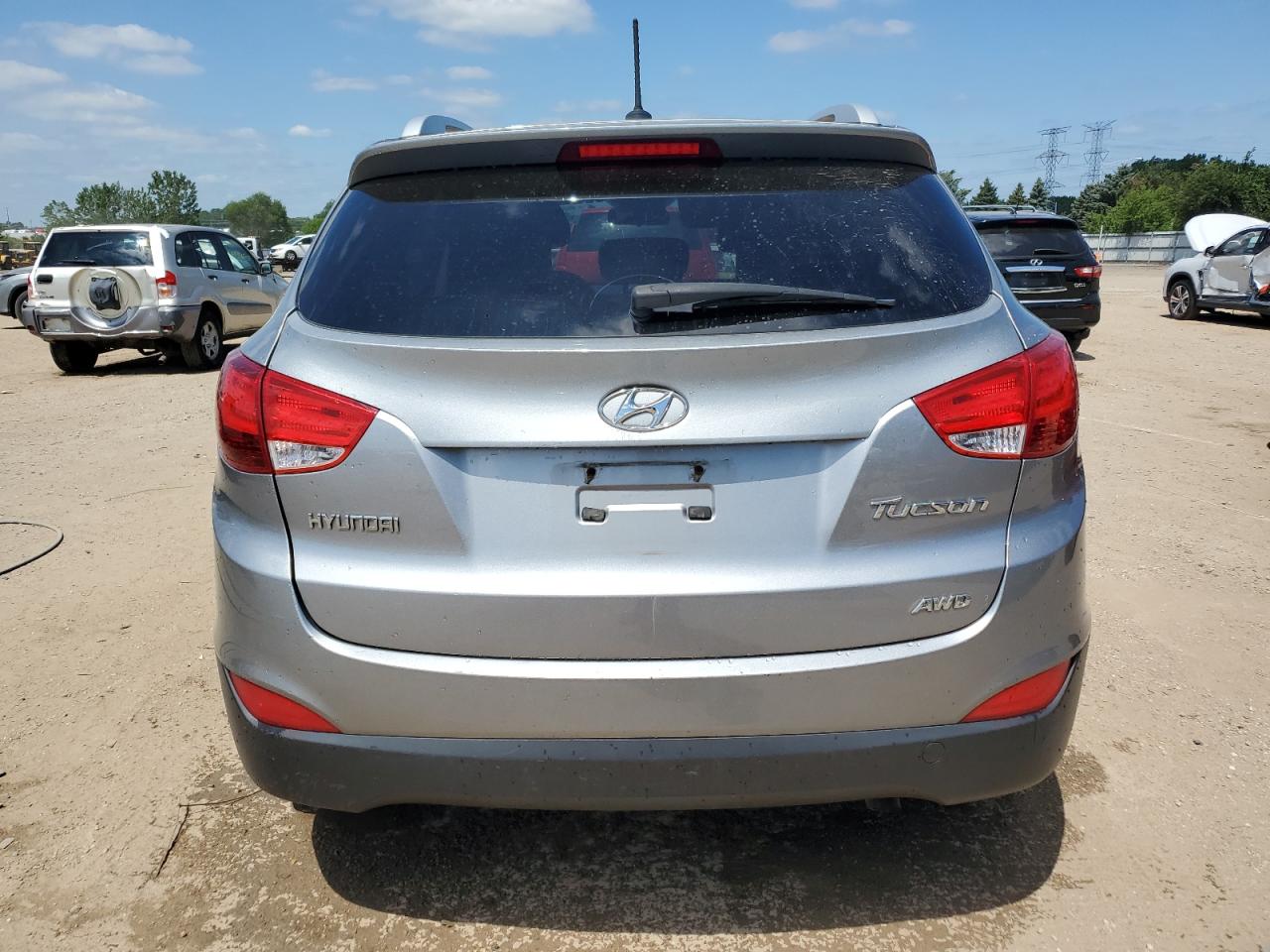 2010 Hyundai Tucson Gls VIN: KM8JUCAC9AU033720 Lot: 65290215