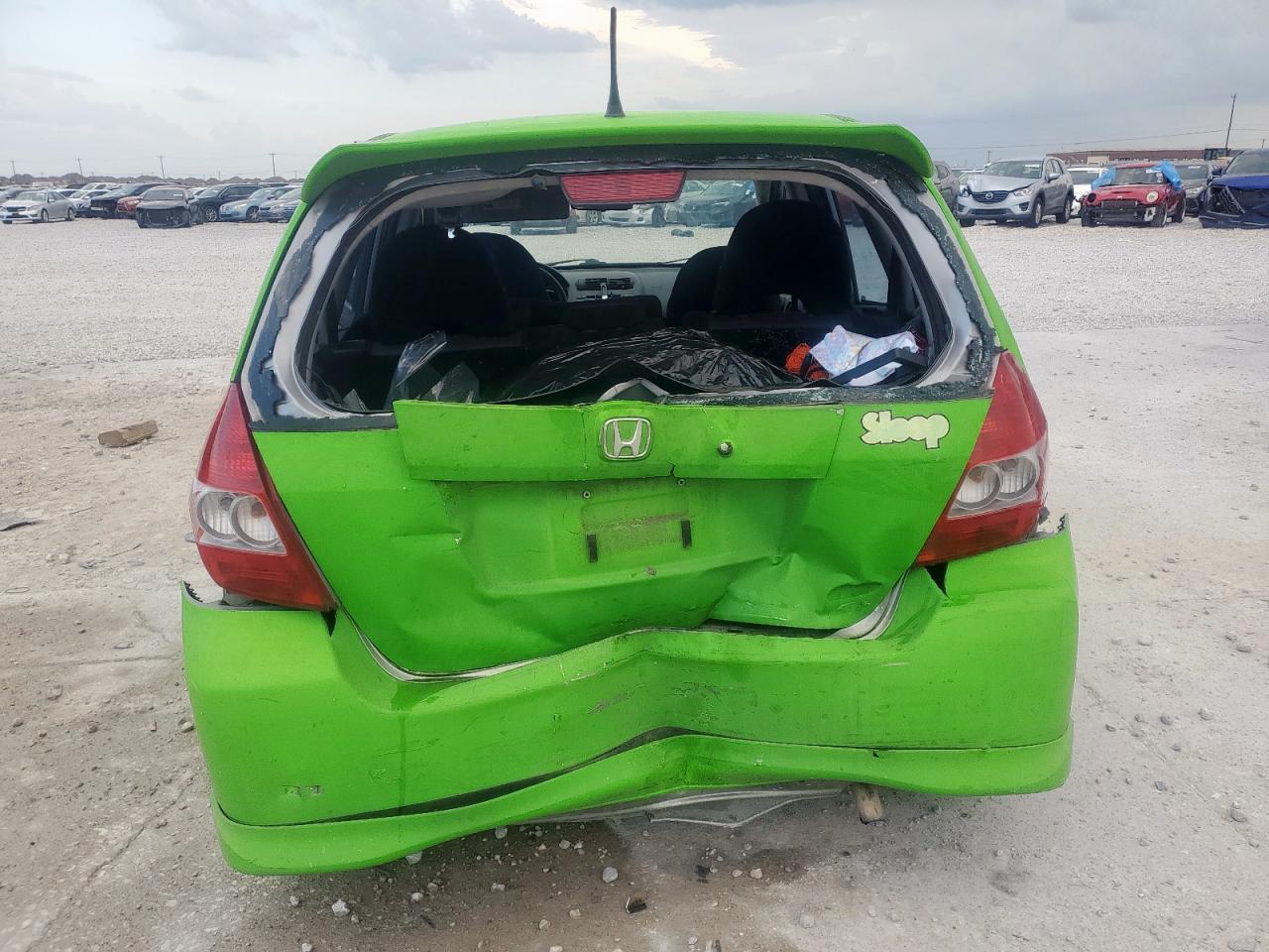 2007 Honda Fit S VIN: JHMGD38667S014771 Lot: 64998775