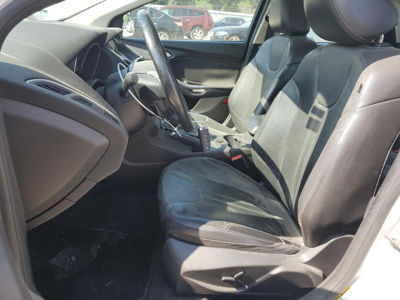 2014 Ford Focus Titanium VIN: 1FADP3J28EL179267 Lot: 65359335