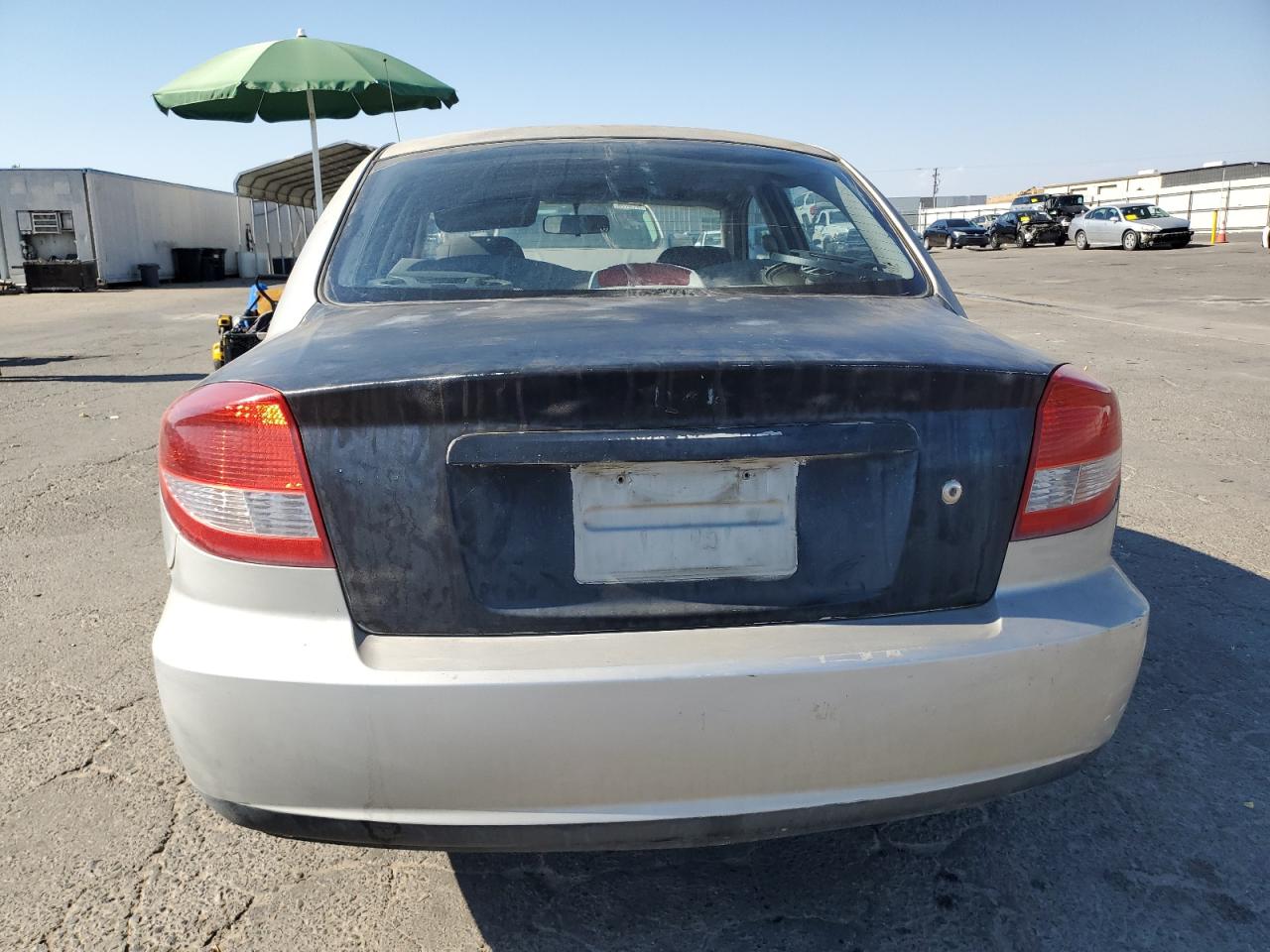 2003 Kia Rio VIN: KNADC125036211317 Lot: 65753445