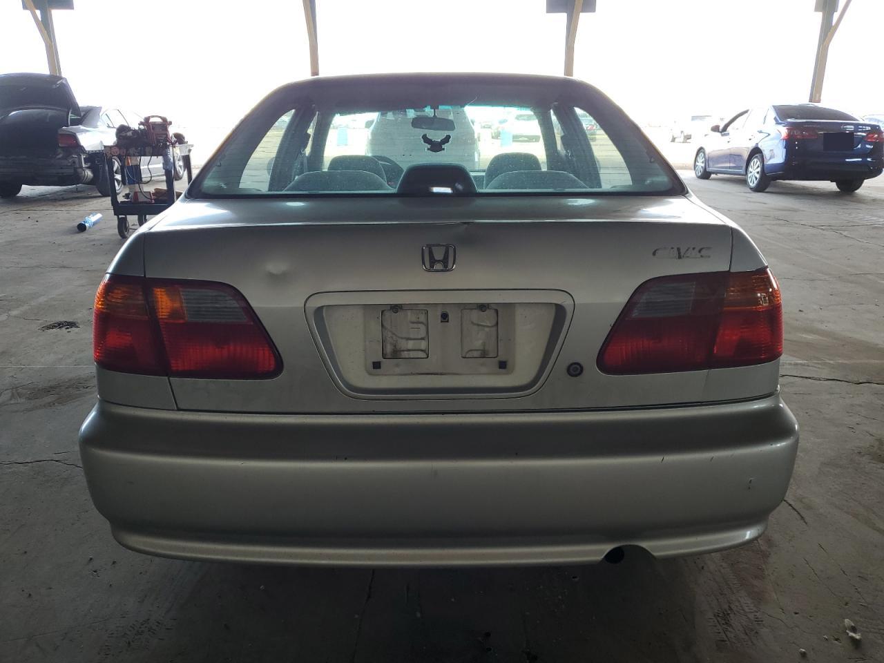 1999 Honda Civic Base VIN: 2HGEJ6610XH559304 Lot: 65701825