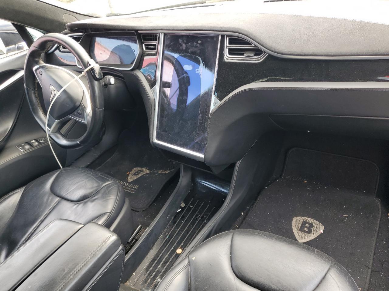 2014 Tesla Model S VIN: 5YJSA1H12EFP62263 Lot: 63258675