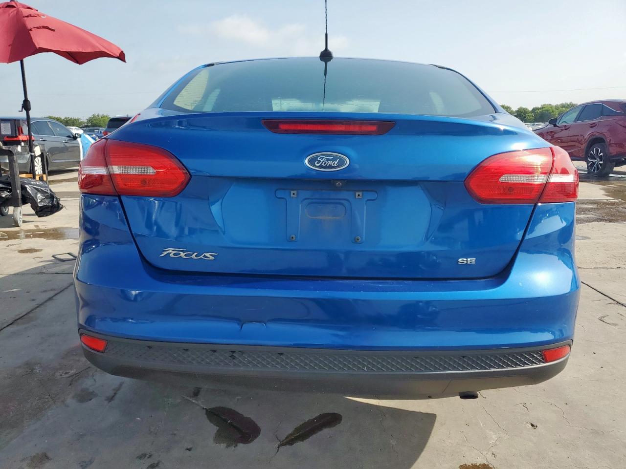 2018 Ford Focus Se VIN: 1FADP3F22JL206921 Lot: 65264355