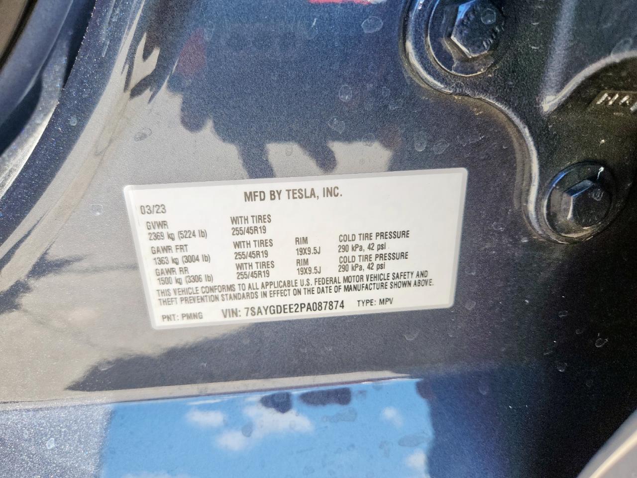 2023 Tesla Model Y VIN: 7SAYGDEE2PA087874 Lot: 66696225