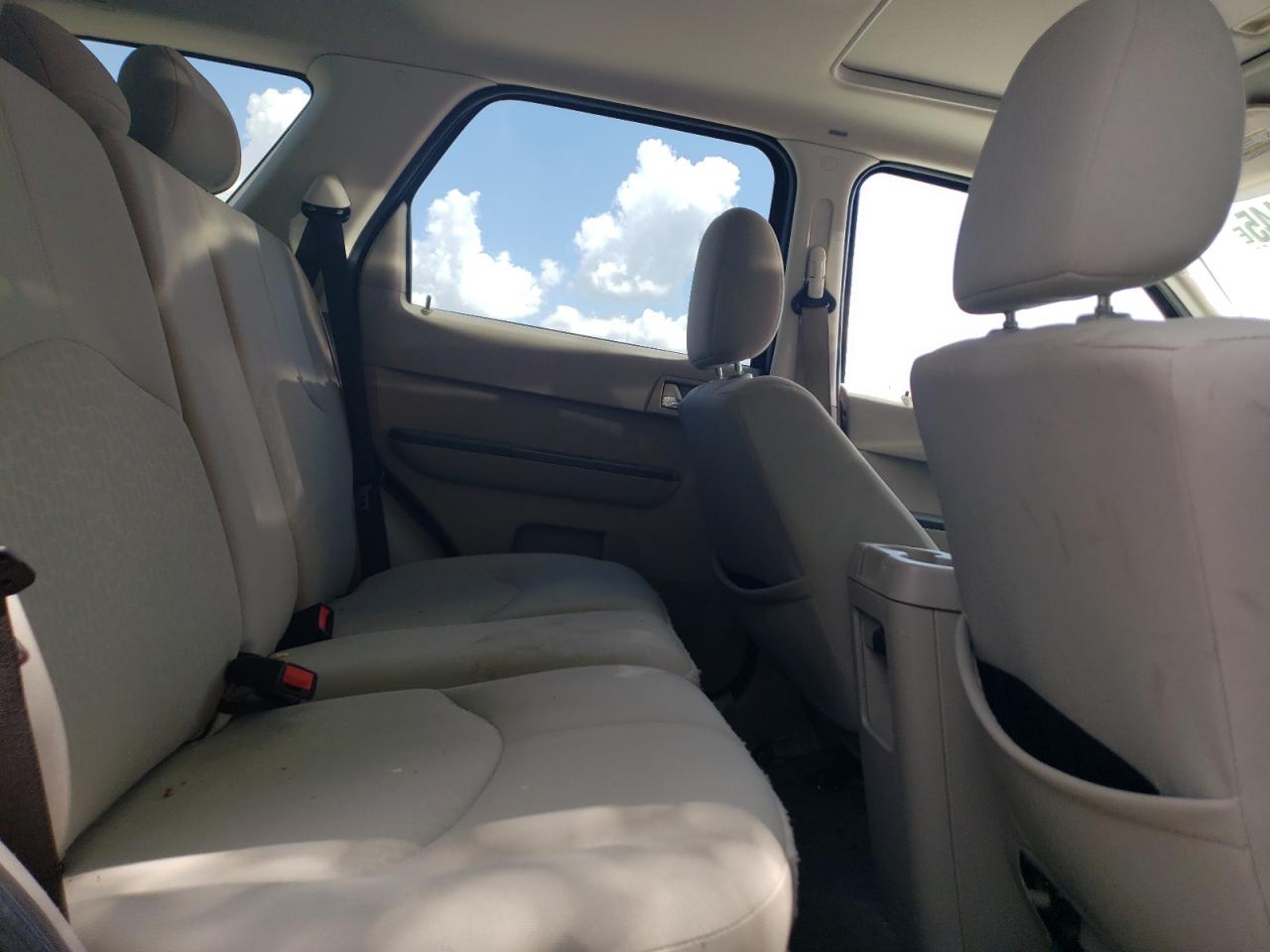 2008 Mercury Mariner VIN: 4M2CU81108KJ10841 Lot: 63063445