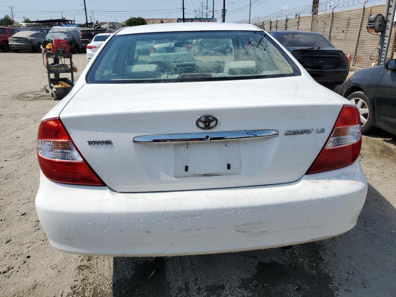 2003 Toyota Camry Le VIN: JTDBE32K830176776 Lot: 65622465