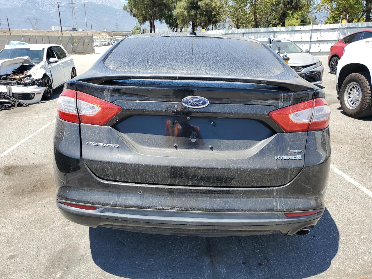 2014 Ford Fusion Se Hybrid VIN: 3FA6P0LUXER379431 Lot: 63678835