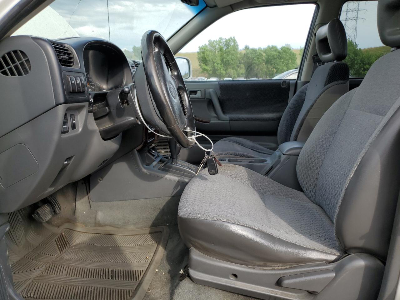 1999 Honda Passport Ex VIN: 4S6CM58W2X4421408 Lot: 63278385
