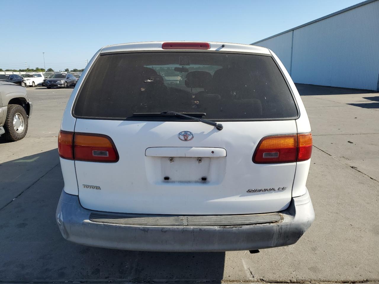 2000 Toyota Sienna Ce VIN: 4T3GF19C9YU300109 Lot: 64864685