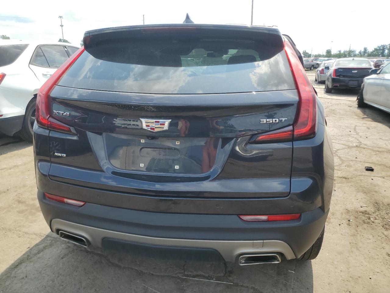 2023 Cadillac Xt4 Premium Luxury VIN: 1GYFZDR40PF109704 Lot: 63380015