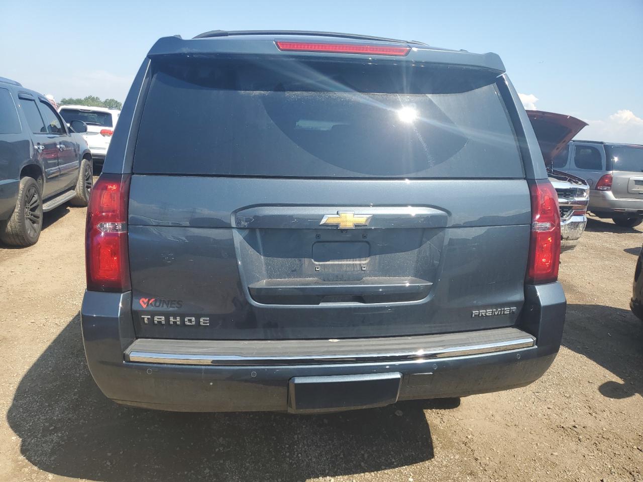 2019 Chevrolet Tahoe K1500 Premier VIN: 1GNSKCKCXKR360927 Lot: 64022375