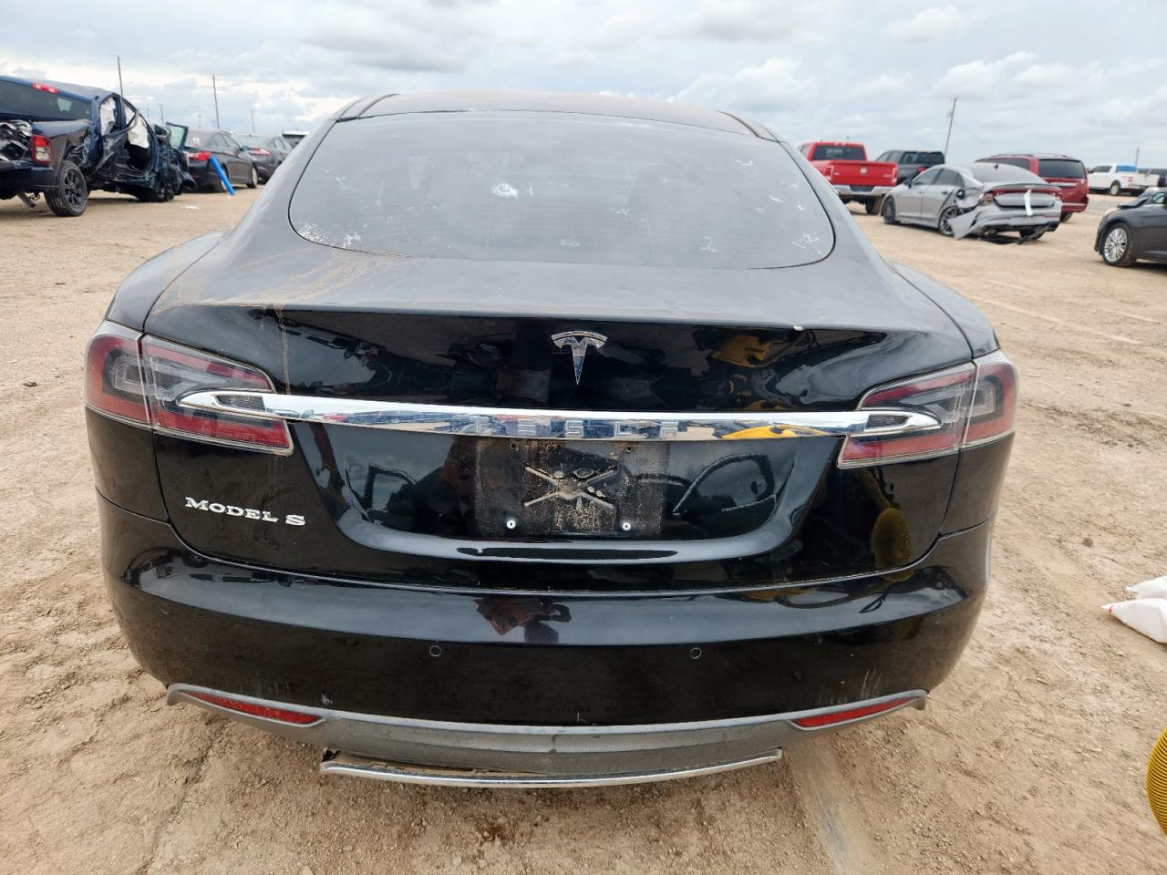 2014 Tesla Model S VIN: 5YJSA1S12EFP32379 Lot: 61994595