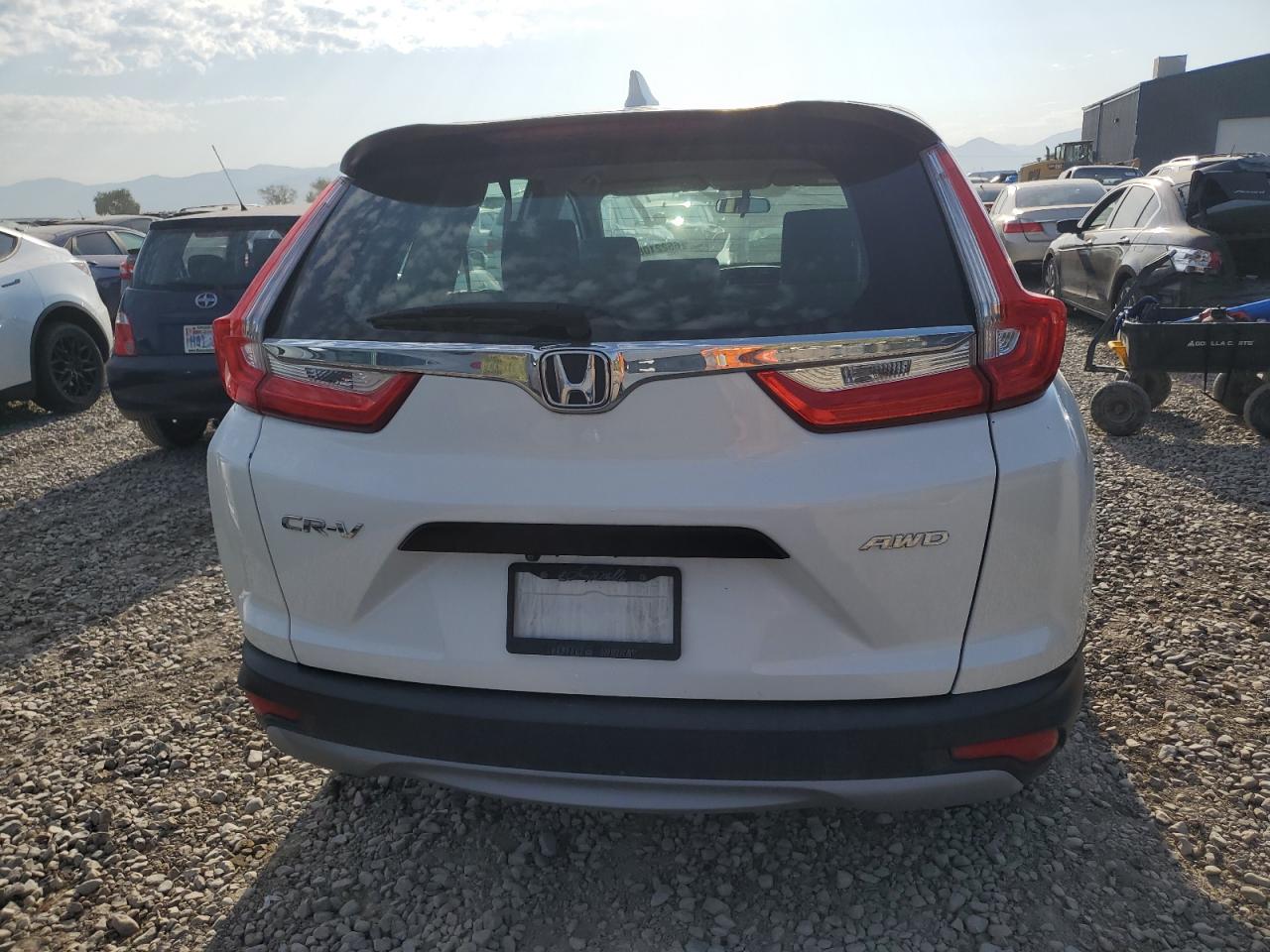 2019 Honda Cr-V Lx VIN: 2HKRW6H32KH209723 Lot: 65221085