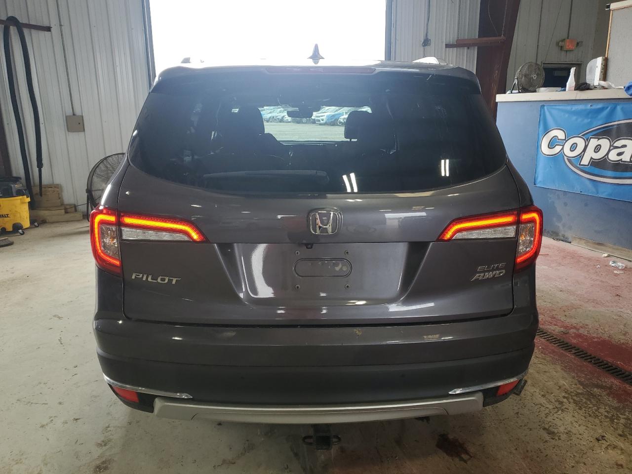2021 Honda Pilot Elite VIN: 5FNYF6H02MB014076 Lot: 62064555