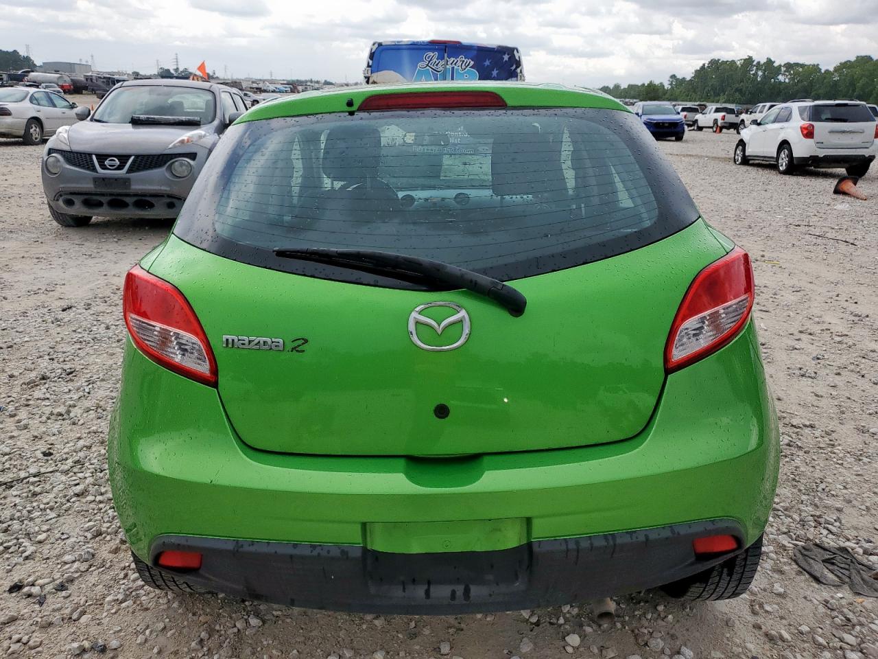 2011 Mazda Mazda2 VIN: JM1DE1HZ1B0124678 Lot: 64004075