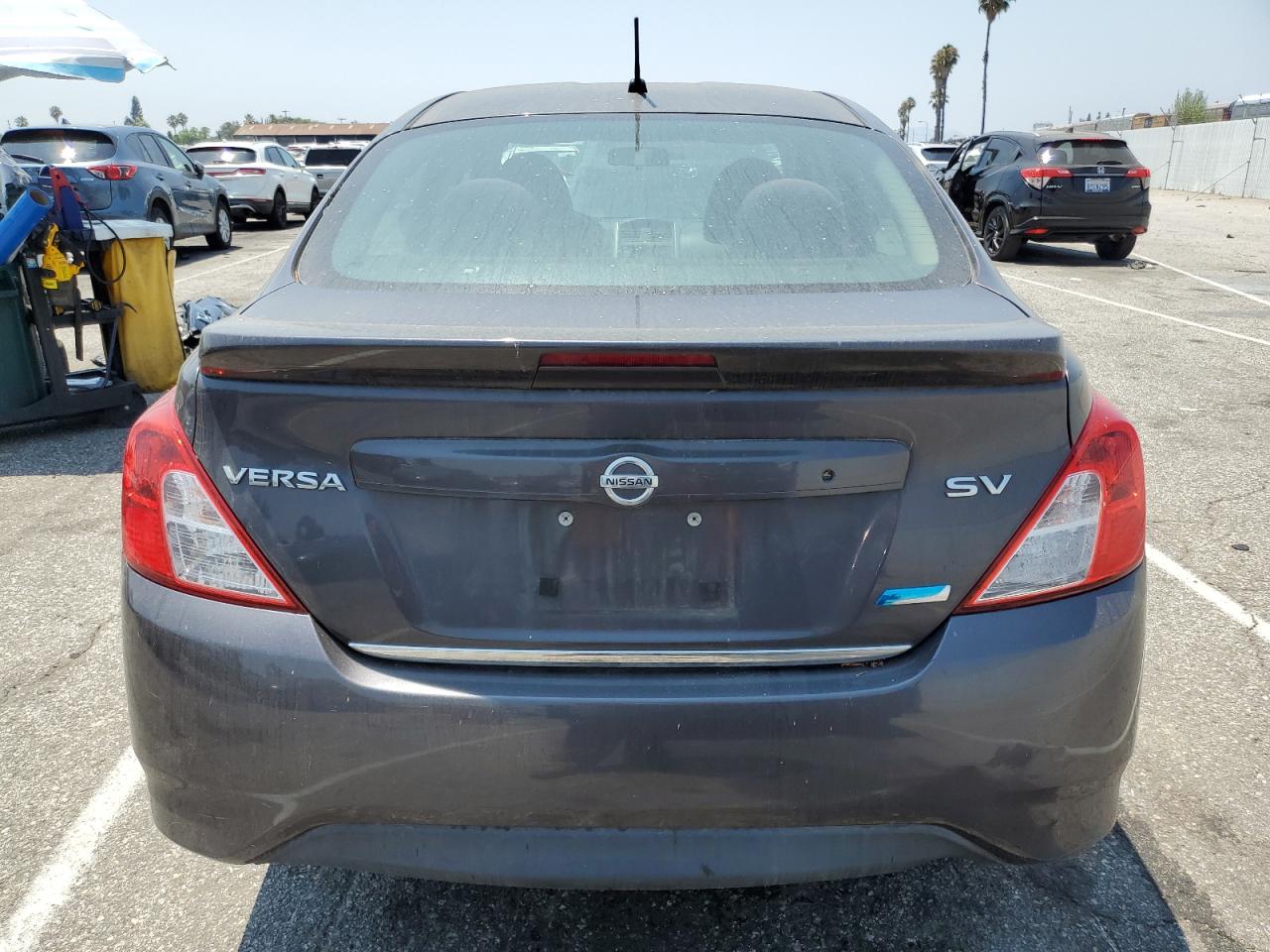 2015 Nissan Versa S VIN: 3N1CN7AP4FL915404 Lot: 64859255