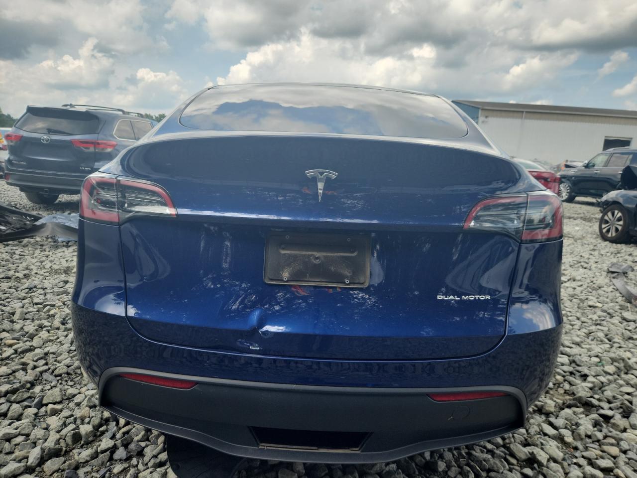 2023 Tesla Model Y VIN: 7SAYGAEE7PF797905 Lot: 65114325