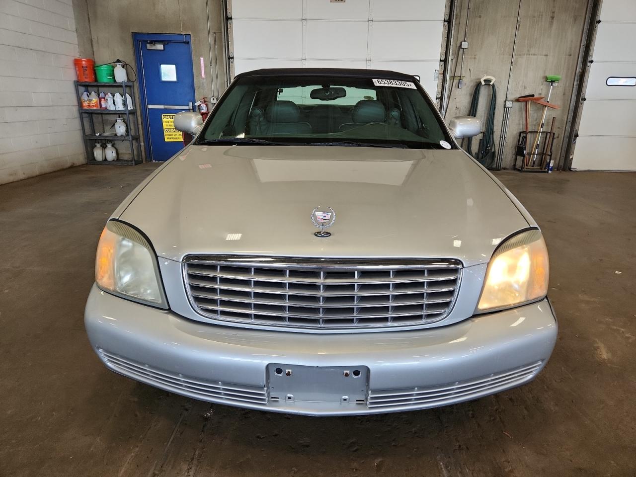 2003 Cadillac Deville VIN: 1G6KD54Y43U122323 Lot: 65383305