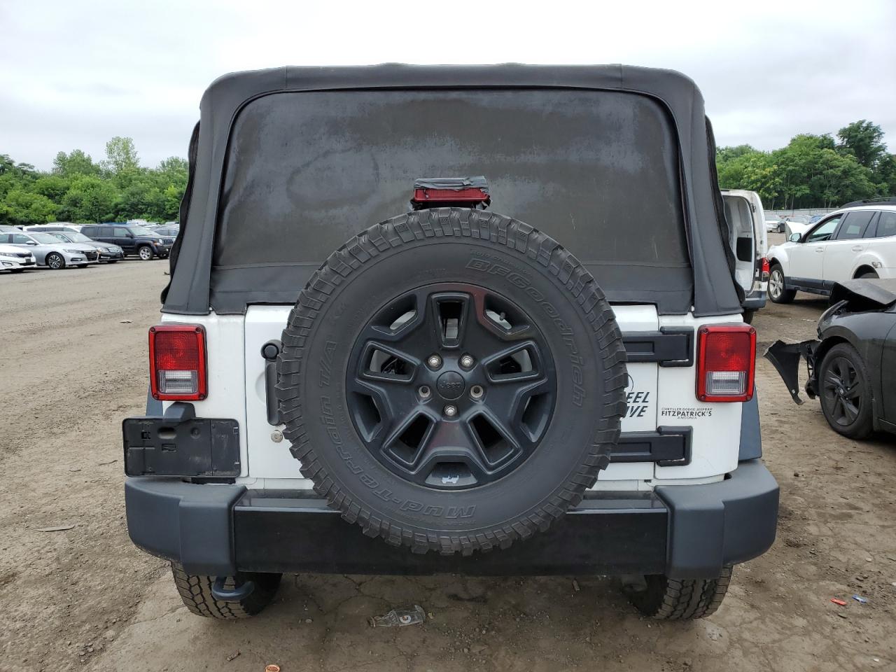 2015 Jeep Wrangler Sport VIN: 1C4AJWAG3FL747552 Lot: 64500575