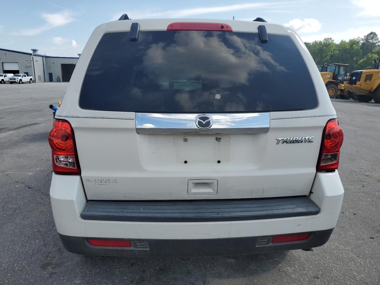 2010 Mazda Tribute I VIN: 4F2CY0C74AKM02754 Lot: 62358295