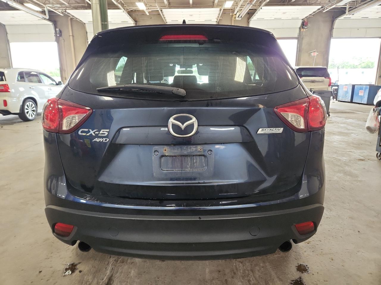 2015 Mazda Cx-5 Touring VIN: JM3KE4CY5F0538244 Lot: 64789835