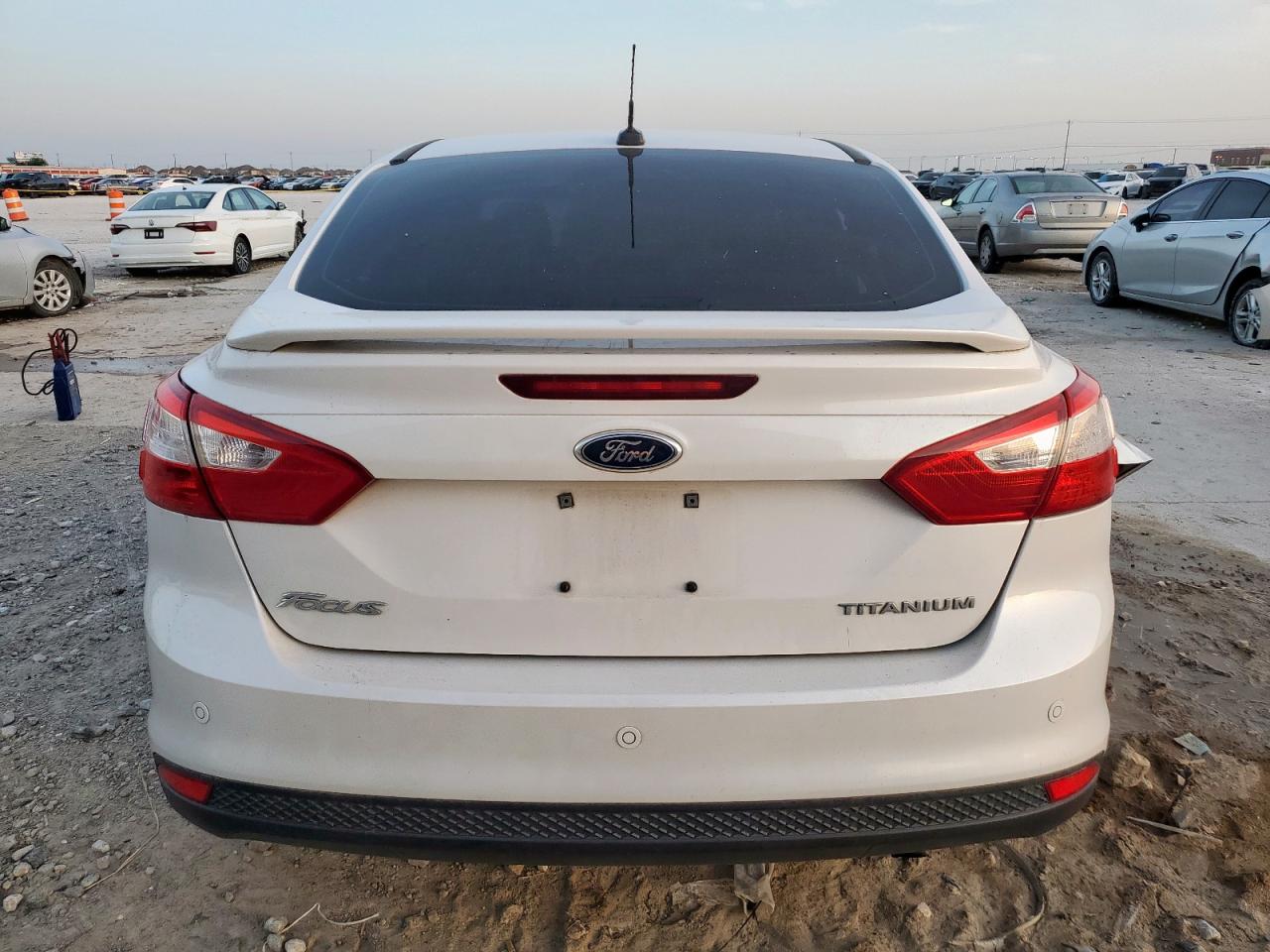 2012 Ford Focus Titanium VIN: 1FAHP3J21CL330464 Lot: 65143735