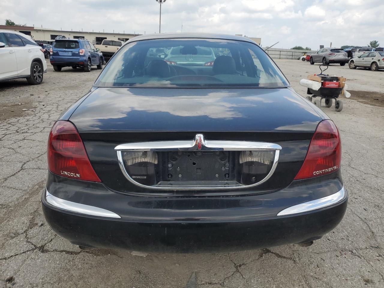 2001 Lincoln Continental VIN: 1LNHM97V01Y656839 Lot: 64583255